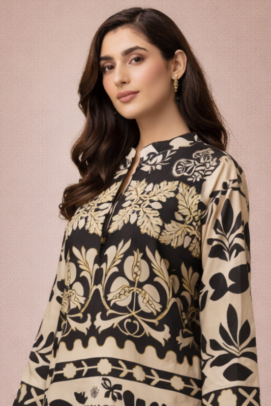 Woman wearing a black and white patterned outfit on a beige background